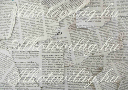 Újságpapír darabok szürkében