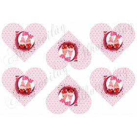 Valentin napi holdon ülő manópár pöttyös szíveken